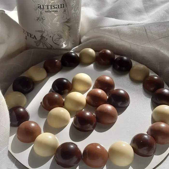 Chocolaterie et Confiserie Artisanales.
Chocolat Belge.
Mu